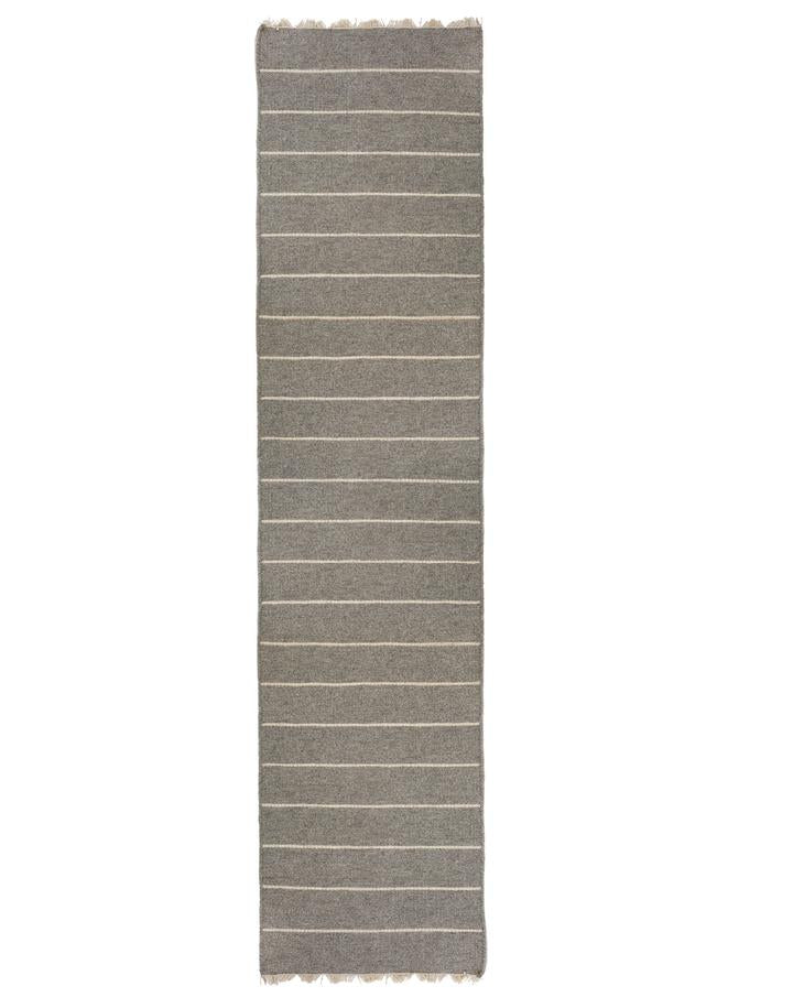 media image for warby handwoven rug in light grey in multiple sizes design by pom pom at home 6 281