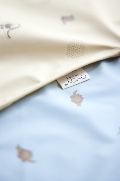 product image for dino cape bib in dusty green 2 34