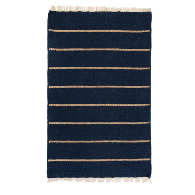 product image of warby handwoven rug in navy in multiple sizes design by pom pom at home 1 519