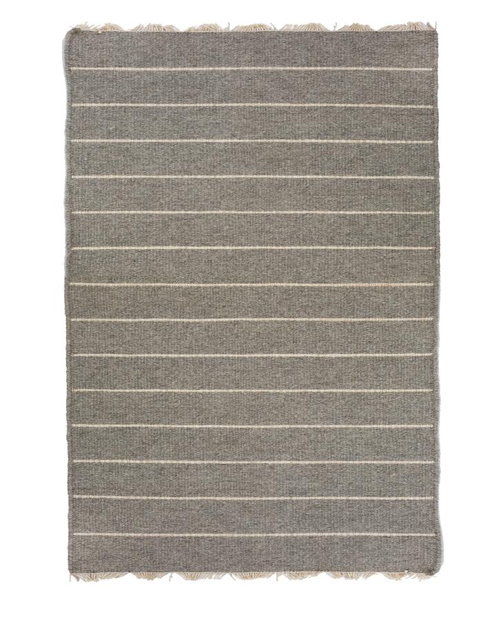 media image for warby handwoven rug in light grey in multiple sizes design by pom pom at home 4 238